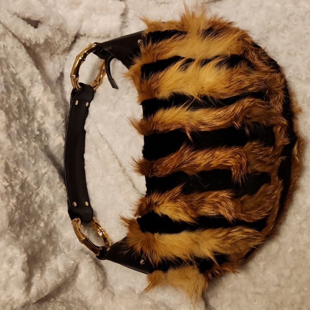 Gucci fox fur gold bamboo leather bag